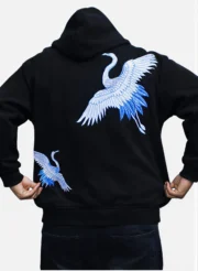 Dos du hoodie OSAR noir, double broderie grues impériales